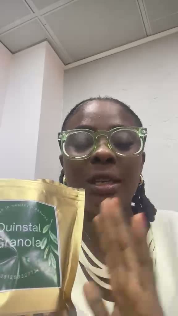 Customer holding a Quinstal pouch: From the office, with love